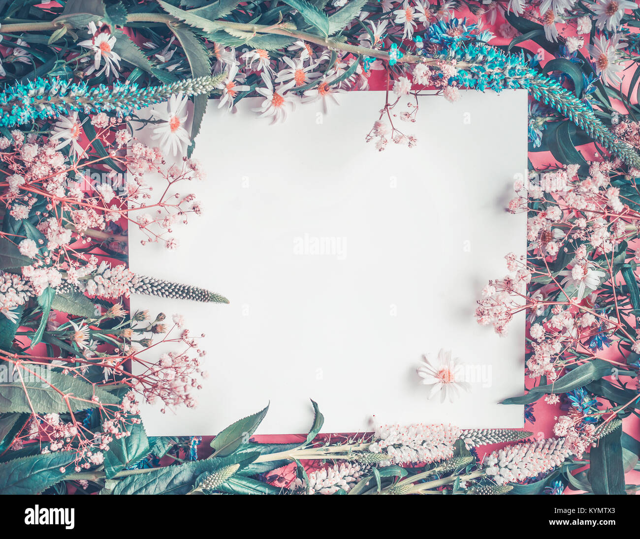 blank white greeting card layout on flowers background, top