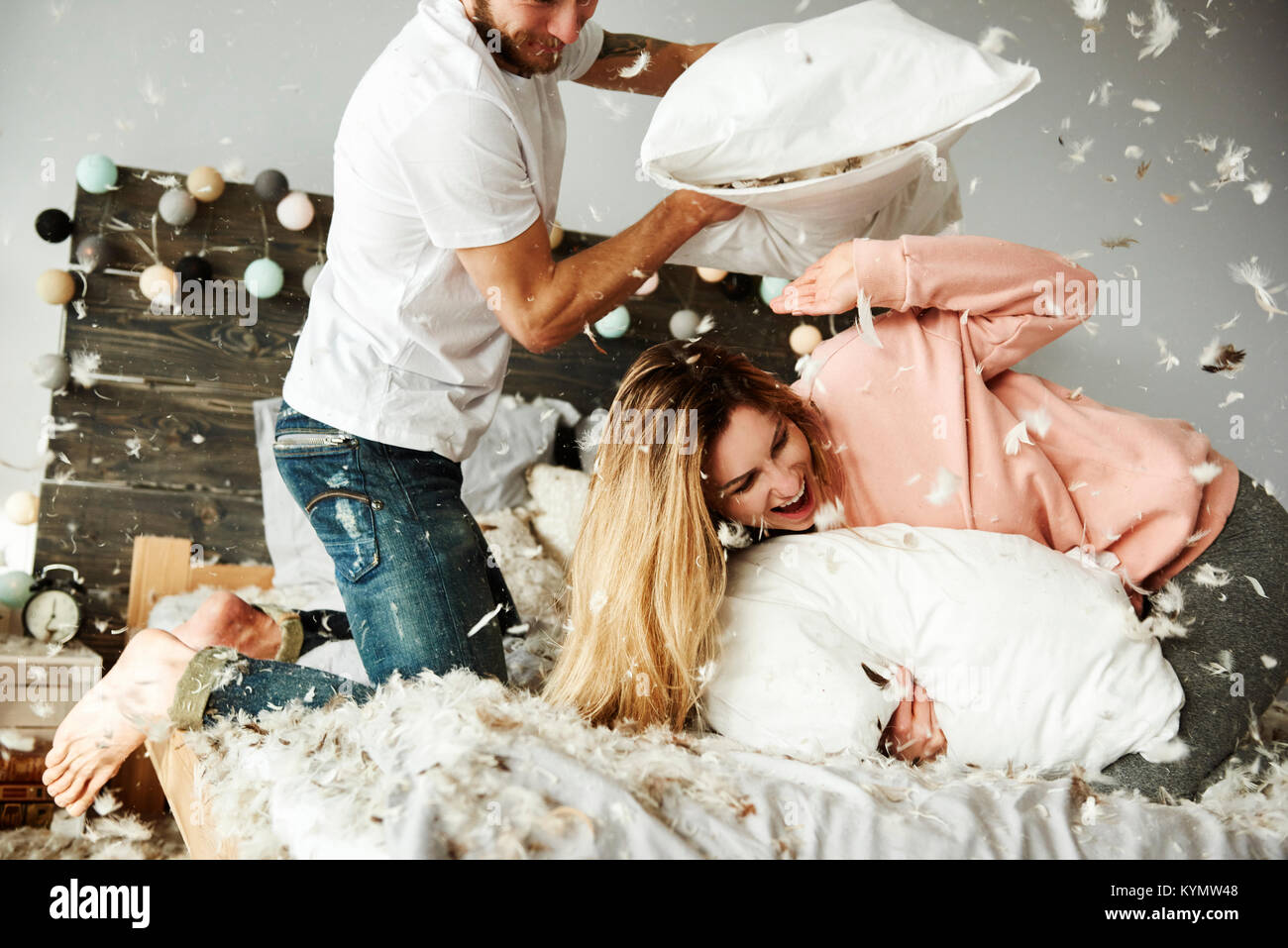 Couple pillow fight hires stock photography and images Alamy