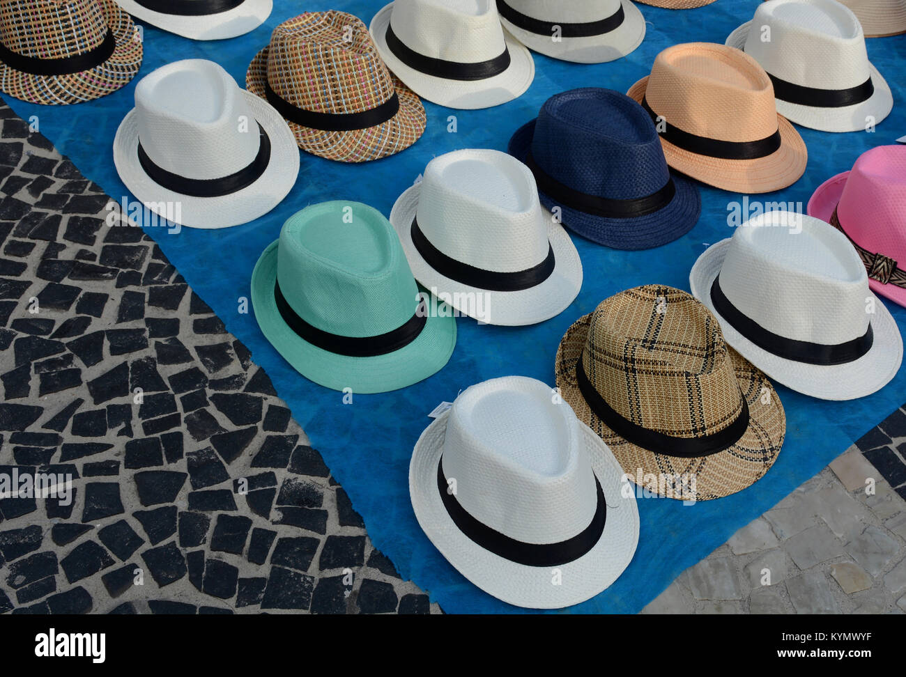 man hats on pavement, Copacabana, Rio 