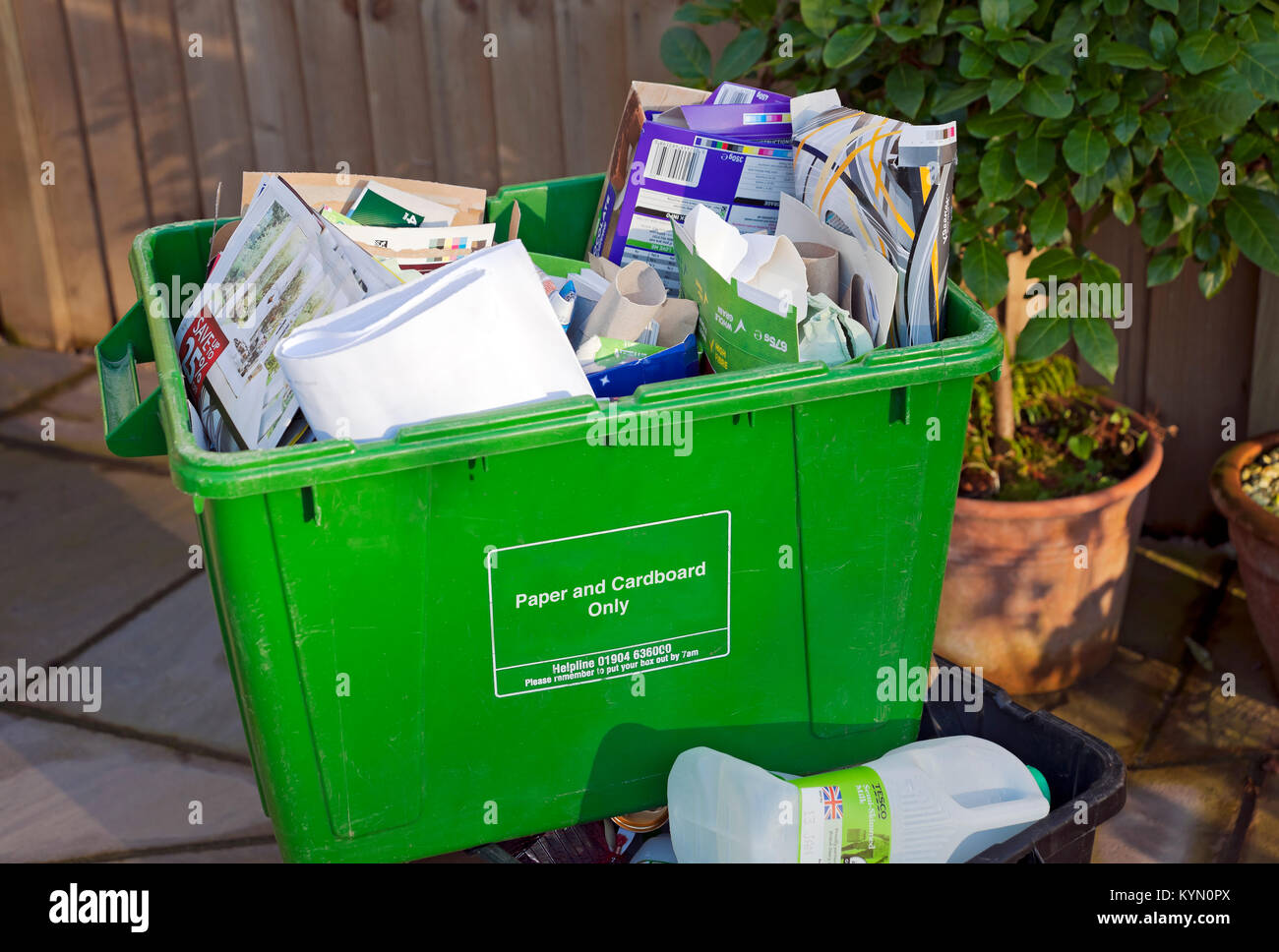 Close up of paper and card in recycling boxes recycle waste box England