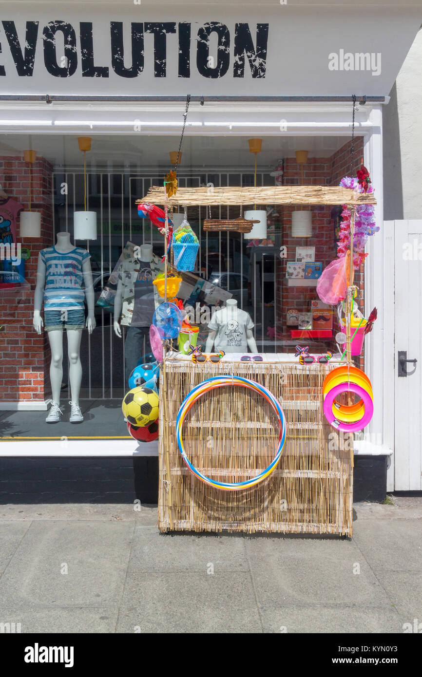 A colourtul display of childrens beach toys outside a shop in Tynemouth, Tyne and Wear, UK Stock Photo