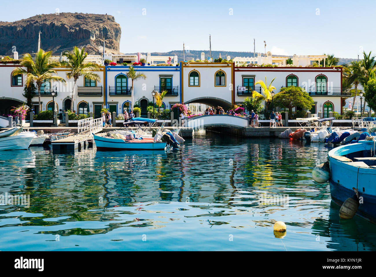 Colourful port with palm trees Puerto De Mogan on Gran Canaria island ...