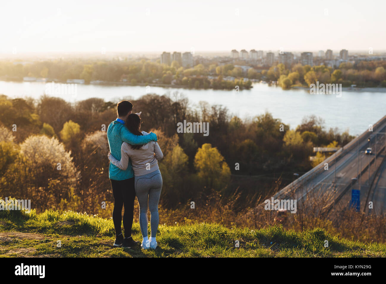 Happy young sporty couple sharing romantic moments Stock Photo - Alamy
