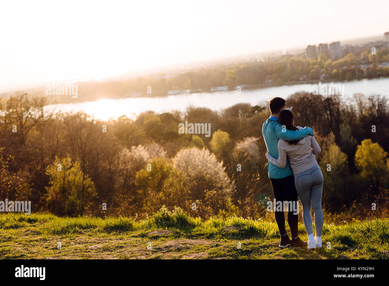 Happy young sporty couple sharing romantic moments Stock Photo - Alamy
