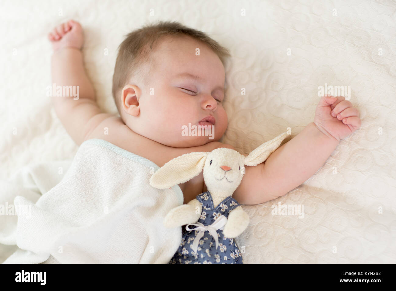 Sweet baby sleeping under blanket at home Stock Photo Alamy