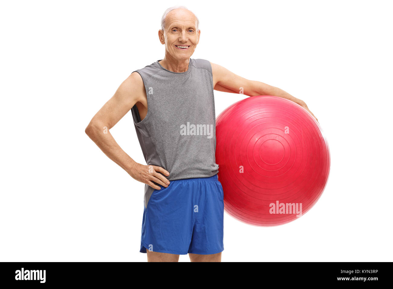 Senior holding an exercise ball isolated on white background Stock Photo