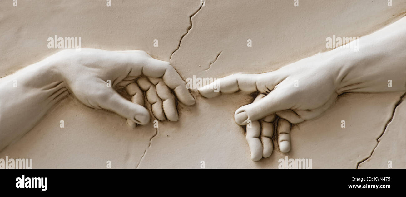 Michelangelo God's touch. Close up of human hands touching with fingers Stock Photo