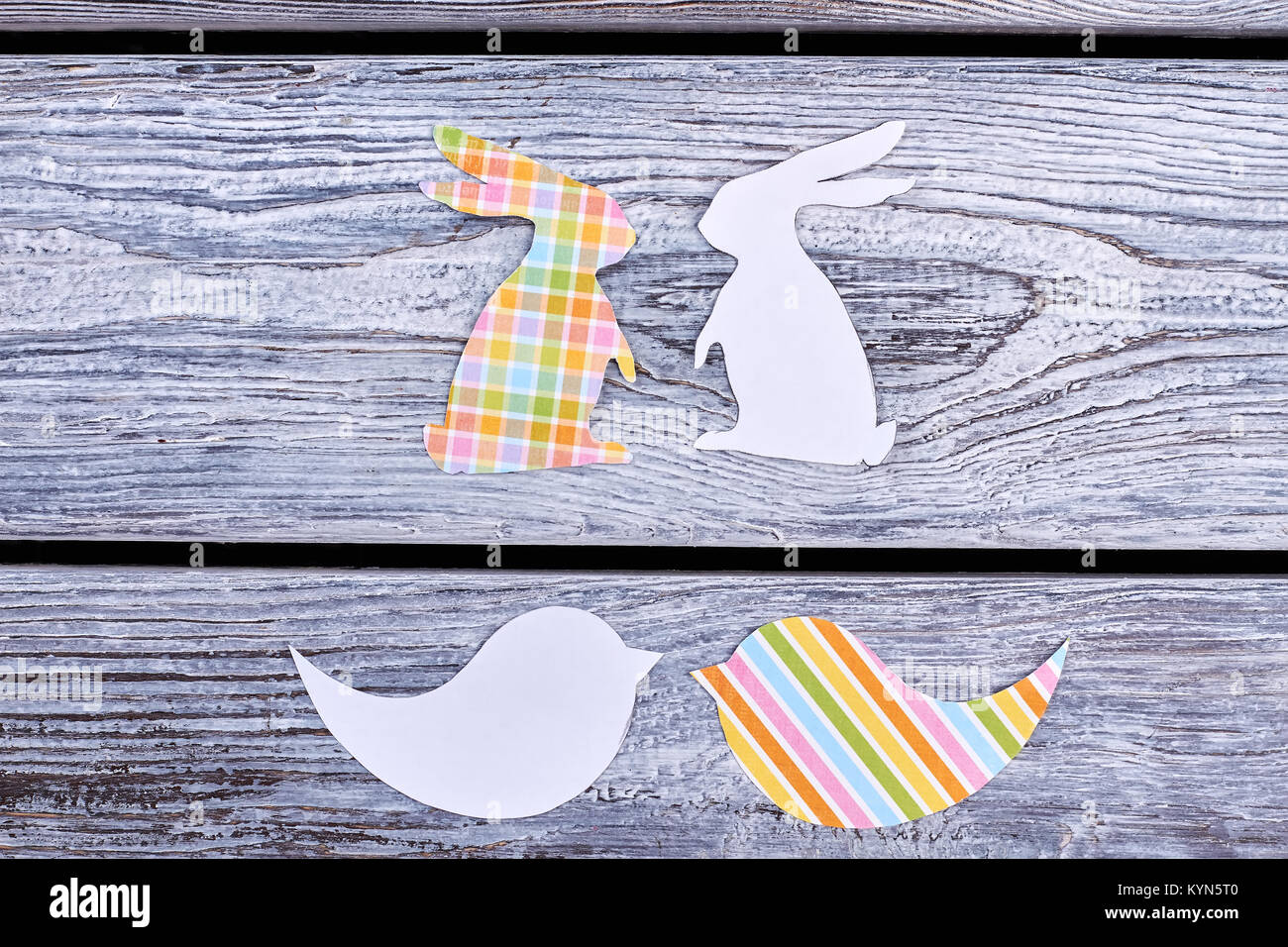 Cut out paper rabbits and birds Stock Photo Alamy