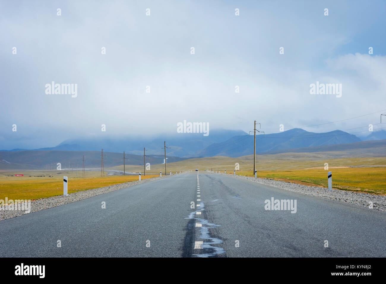 Road over scenic Torugart pass, Kyrgyzstan Stock Photo