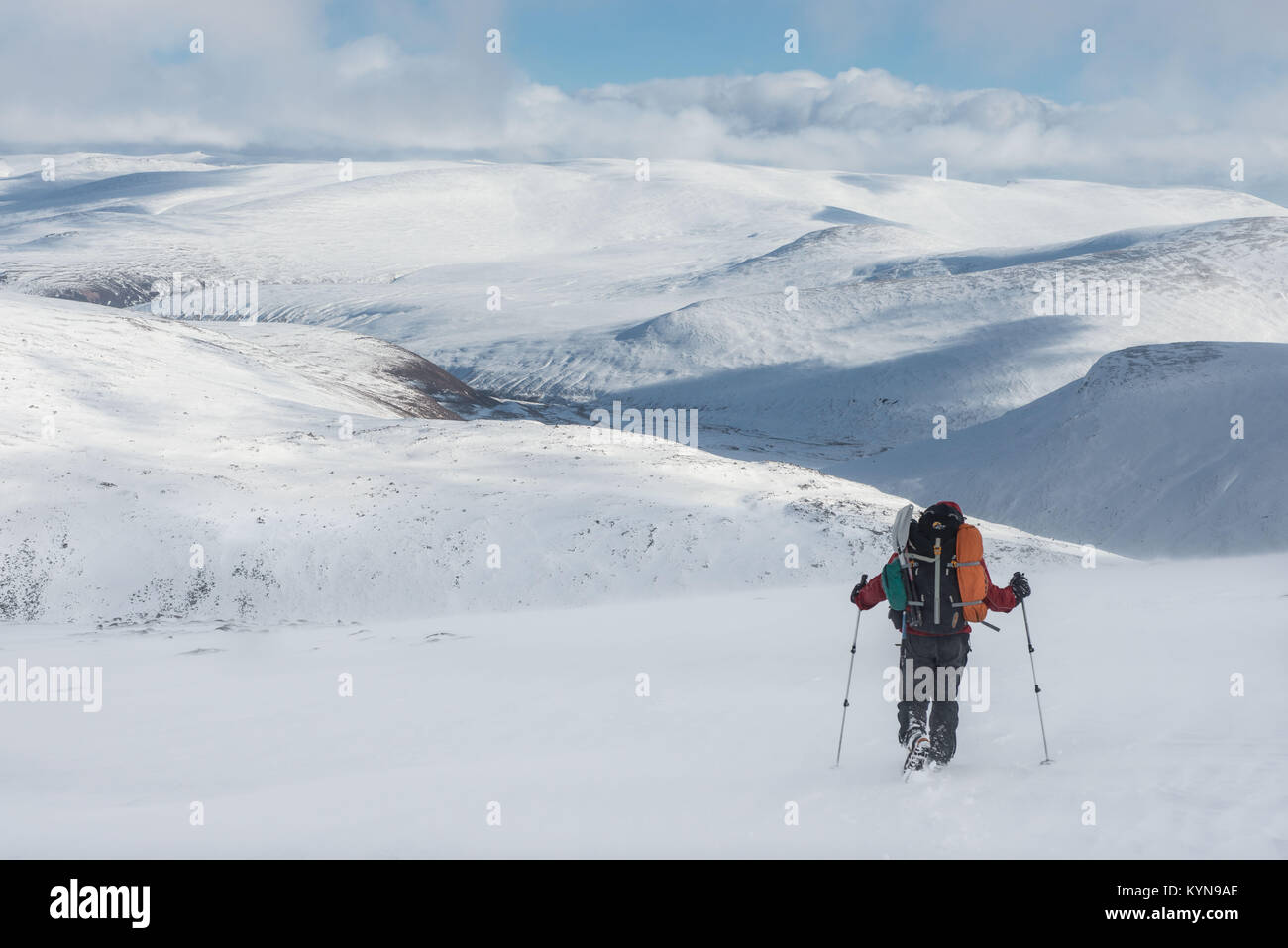 Looking east from Cairn Gorm mountain across the wilderness of the snow covered Cairngorm mountain range Stock Photo
