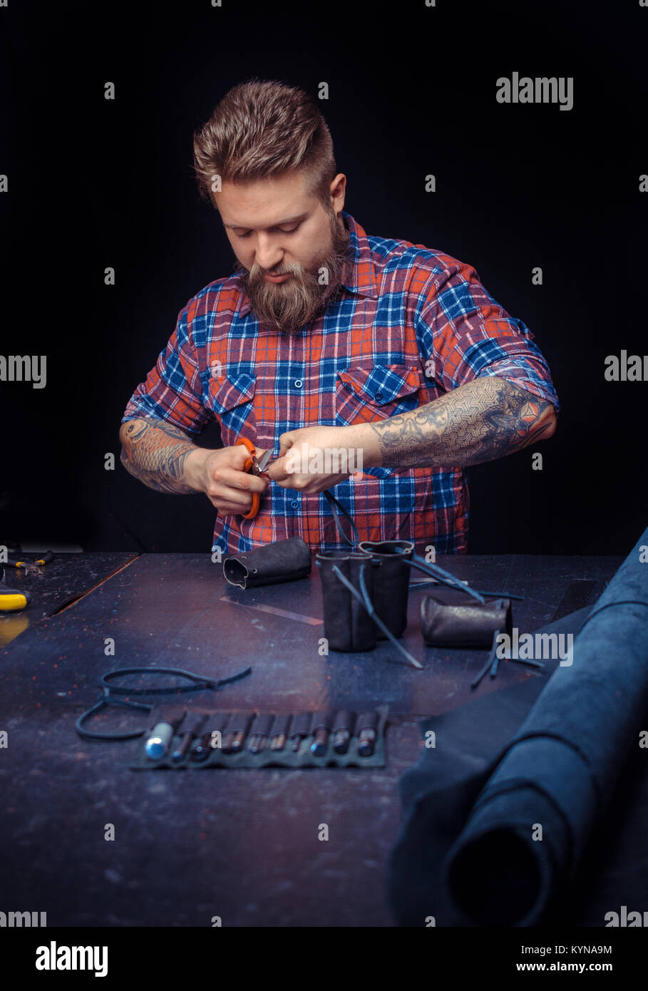 Leather Craftsman at work at leather shop Stock Photo Alamy