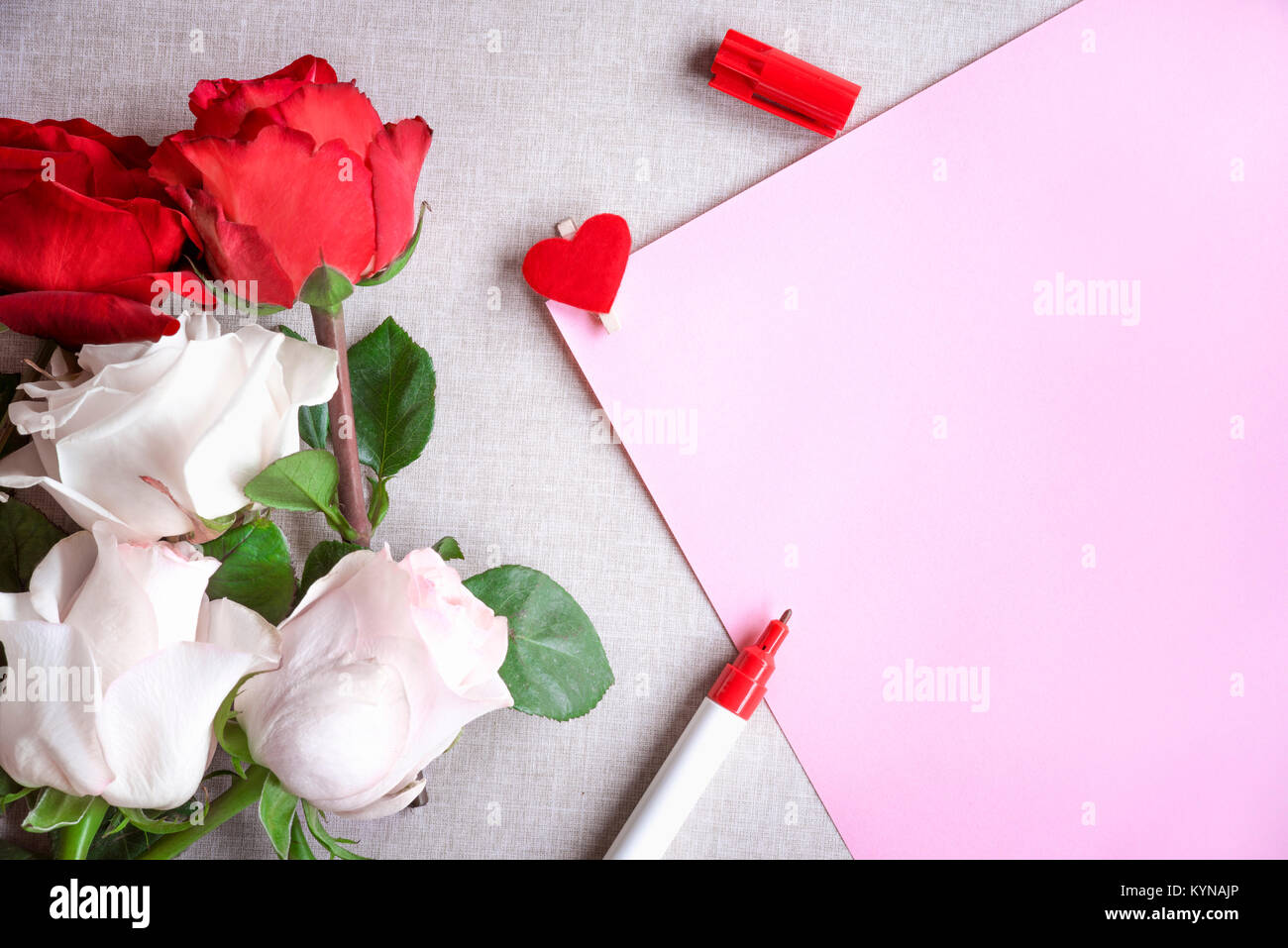 Greeting card idea with red and white roses and a blank pink paper ...