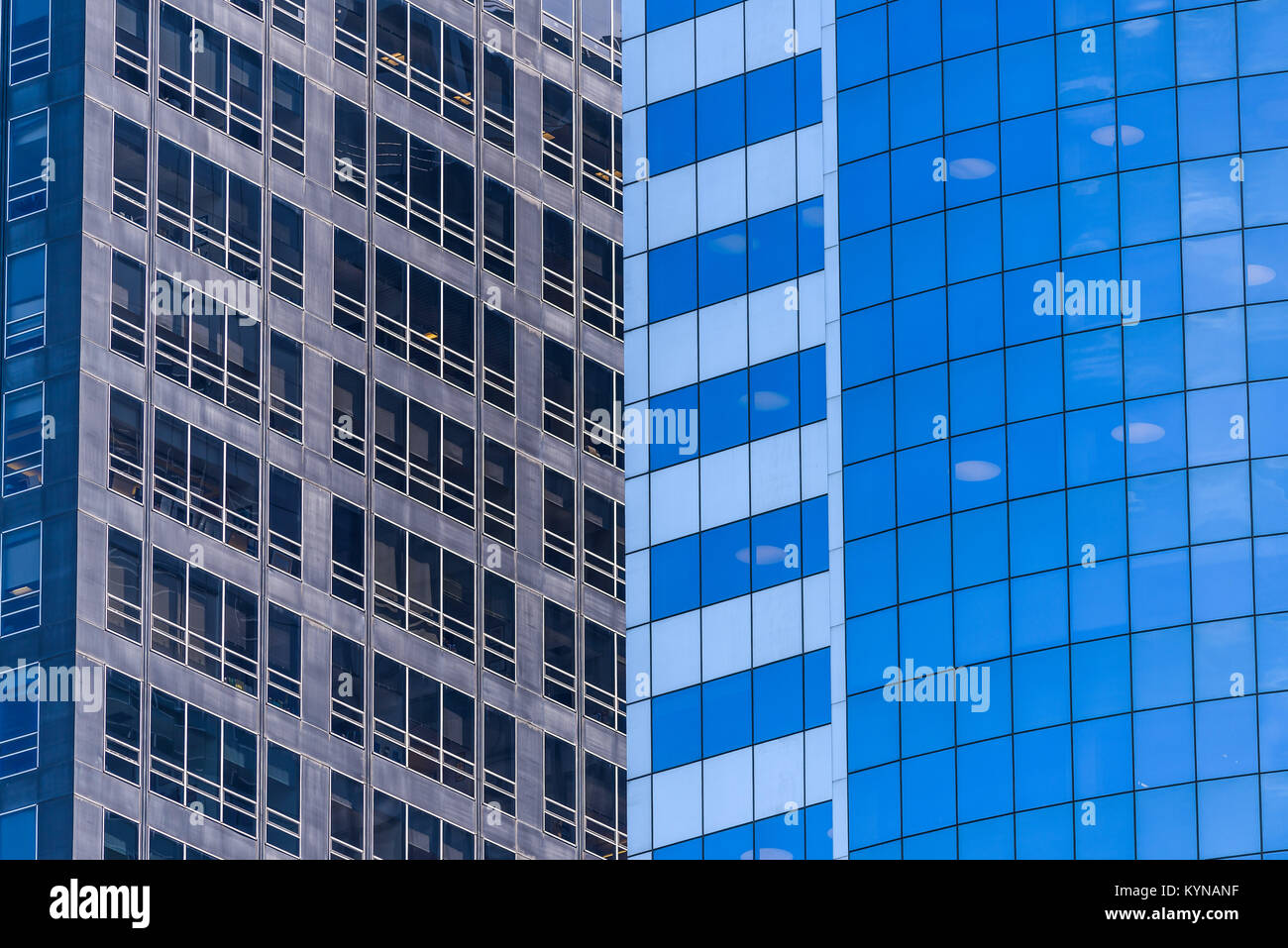 Blue Glass Windows in a skyscraper in Manhattan Stock Photo