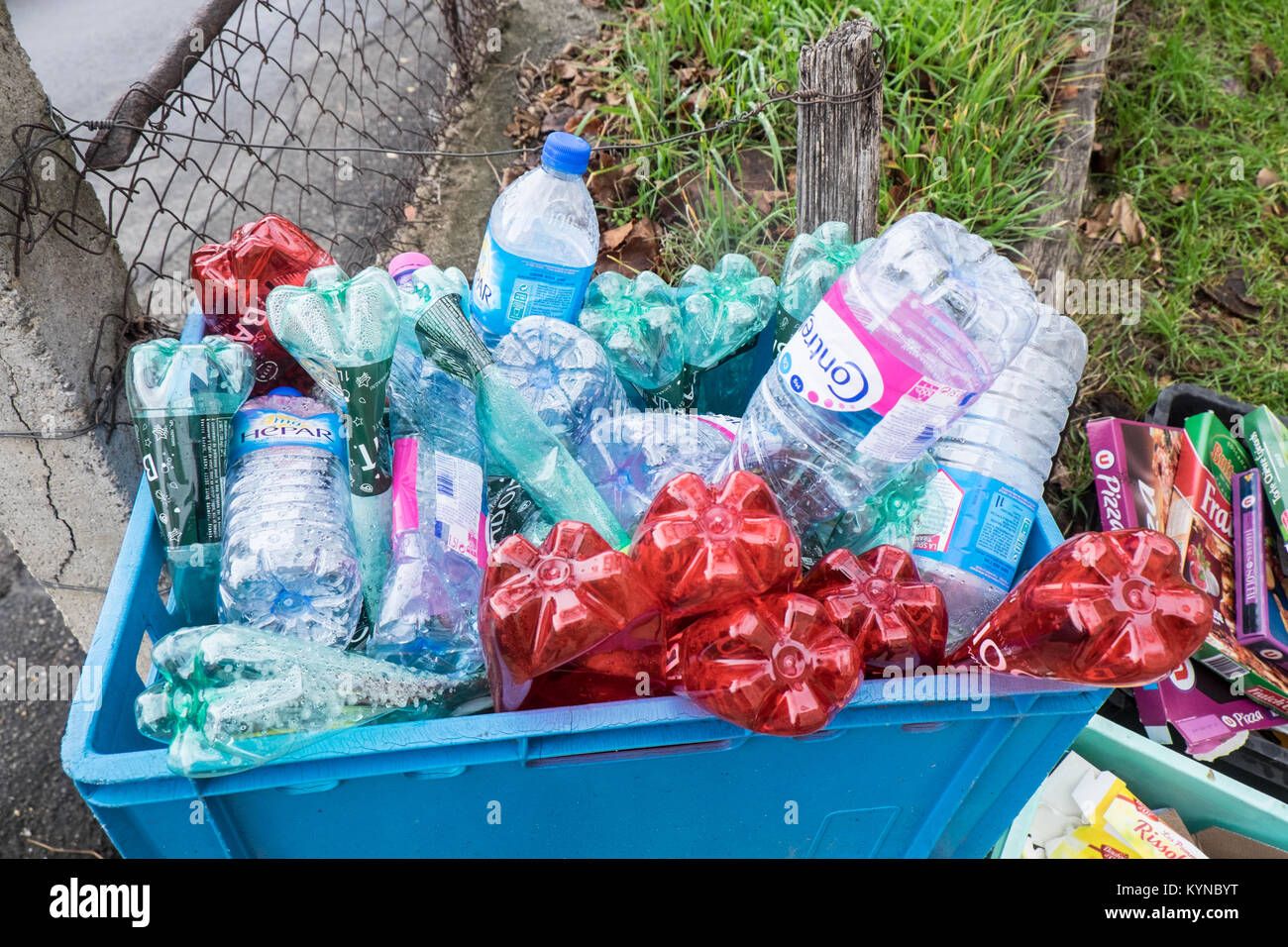 Plastic,bottle,bottles,rubbish,waste,garbage,put,out,for,collection,by,council, authorities,in,village,Montazels,near Couiza,Aude,South,of,France, Stock Photo