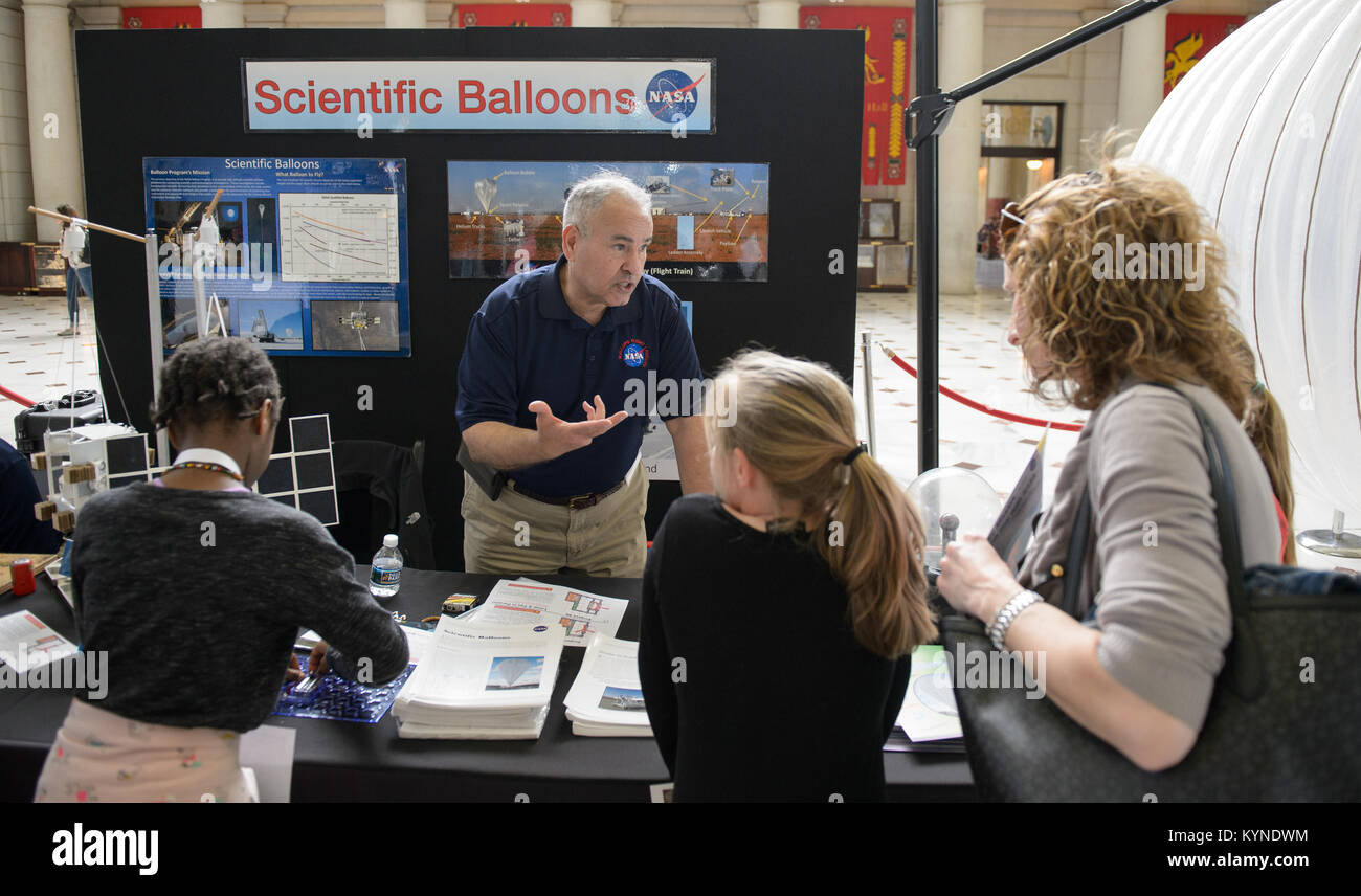 Visitors explore one of NASA's exhibits at the Earth Day event on Thursday, April 20, 2017 at Union Station in Washington, D.C. Photo Credit: (NASA/Joel Kowsky) Stock Photo