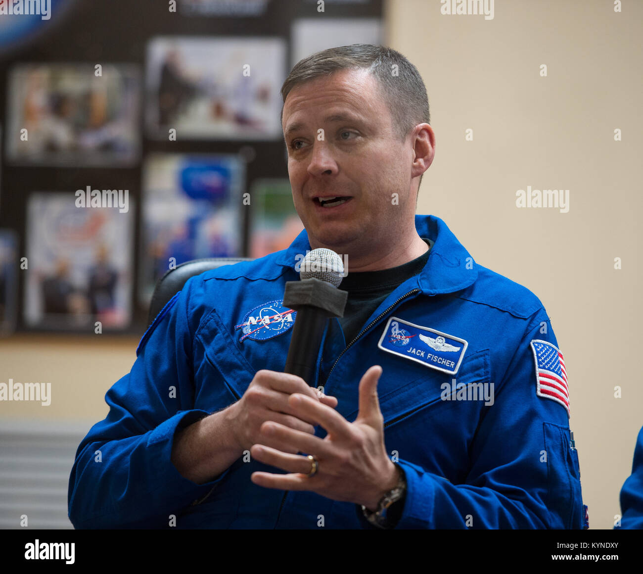 Expedition 51 Flight Engineer Jack Fischer of NASA, answers a question during a press conference on Wednesday, April 19, 2017, at the Cosmonaut Hotel in Baikonur, Kazakhstan. Launch of the Soyuz rocket is scheduled for April 20 and will carry Fischer and Soyuz Commander Fyodor Yurchikhin of Roscosmos into orbit to begin their four and a half month mission on the International Space Station. Photo Credit: (NASA/Aubrey Gemignani) Stock Photo