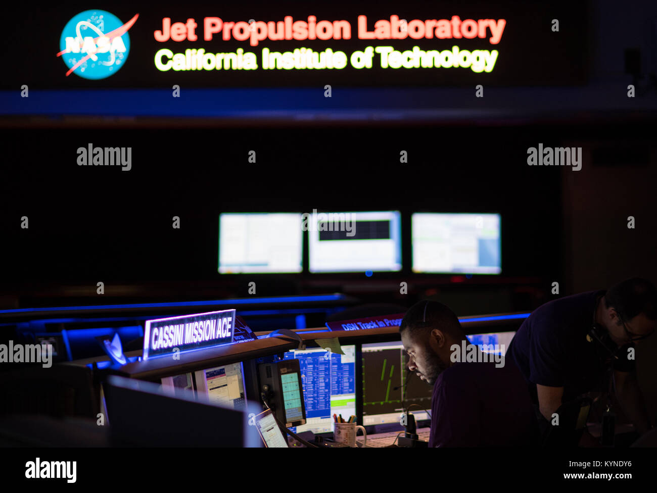 The Cassini Mission Ace console is seen inside the Space Flight Operations Center at NASA's Jet Propulsion Laboratory, Thursday, Sept. 14, 2017 in Pasadena, California. Since its arrival in 2004, the Cassini-Huygens mission has been a discovery machine, revolutionizing our knowledge of the Saturn system and captivating us with data and images never before obtained with such detail and clarity. On Sept. 15, 2017, operators will deliberately plunge the spacecraft into Saturn, as Cassini gathered science until the end. The “plunge” ensures Saturn’s moons will remain pristine for future exploratio Stock Photo
