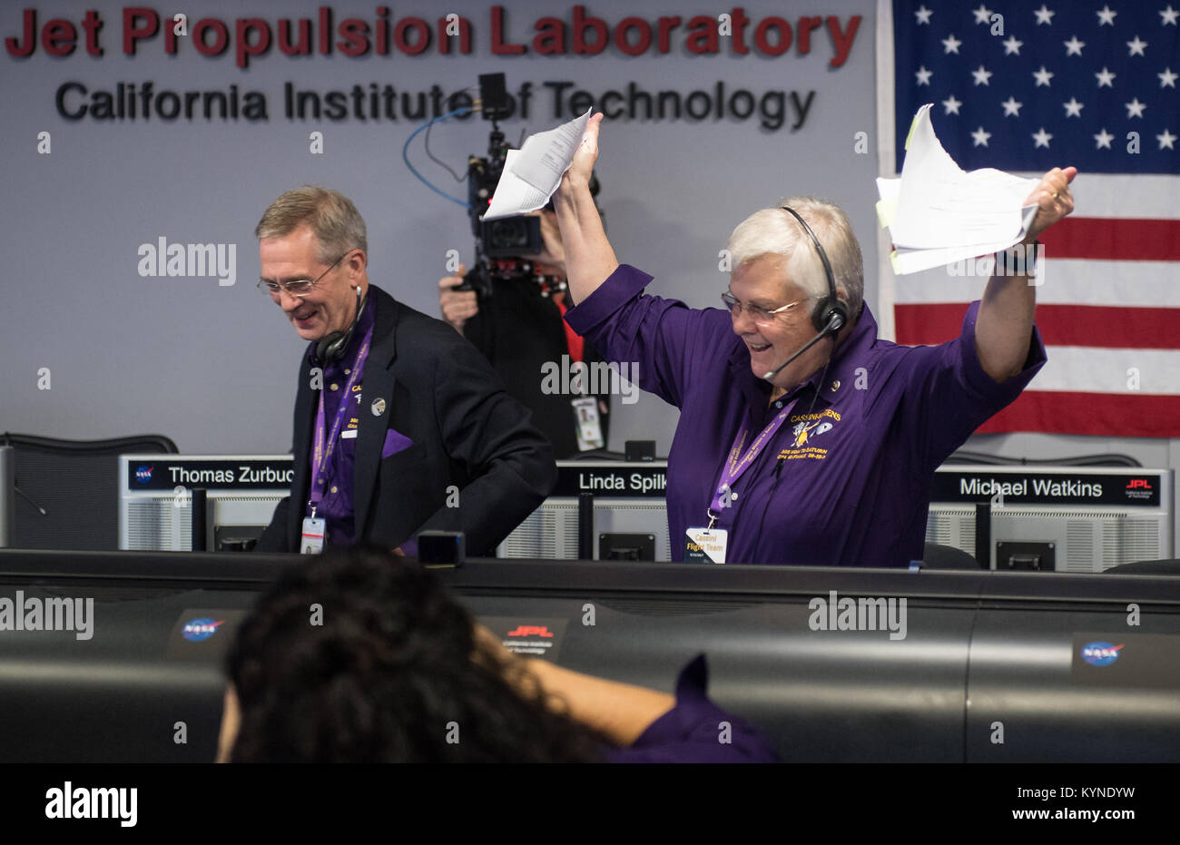 Spacecraft operations team manager for the Cassini mission at Saturn, Julie Webster, rips up the final contingency plan for the Cassini mission, Friday, Sept. 15, 2017 in mission control at NASA's Jet Propulsion Laboratory in Pasadena, California. Since its arrival in 2004, the Cassini-Huygens mission has been a discovery machine, revolutionizing our knowledge of the Saturn system and captivating us with data and images never before obtained with such detail and clarity. On Sept. 15, 2017, operators deliberately plunged the spacecraft into Saturn, as Cassini gathered science until the end. Los Stock Photo