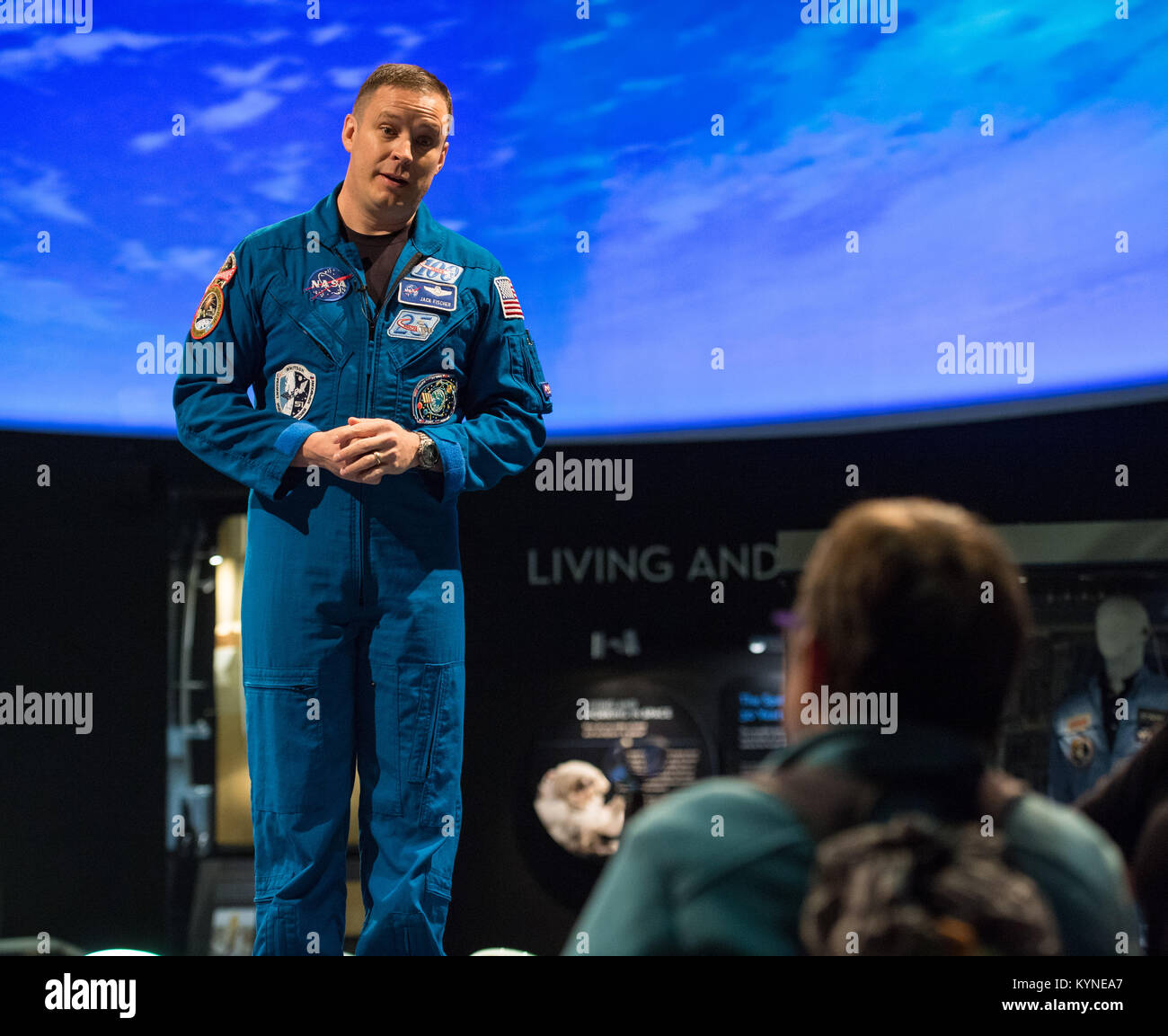 An audience member asks a question after a presentation by NASA astronaut Jack Fischer about his time onboard the International Space Station (ISS) during Expeditions 51/52, Friday, Nov. 3, 2017 at Smithsonian's National Air and Space Museum in Washington. During Expedition 52, Fischer completed hundreds of scientific experiments and two spacewalks, and concluded his 136-day mission when he landed in a remote area near the town of Zhezkazgan, Kazakhstan in September 2017. Photo Credit: (NASA/Aubrey Gemignani) Stock Photo