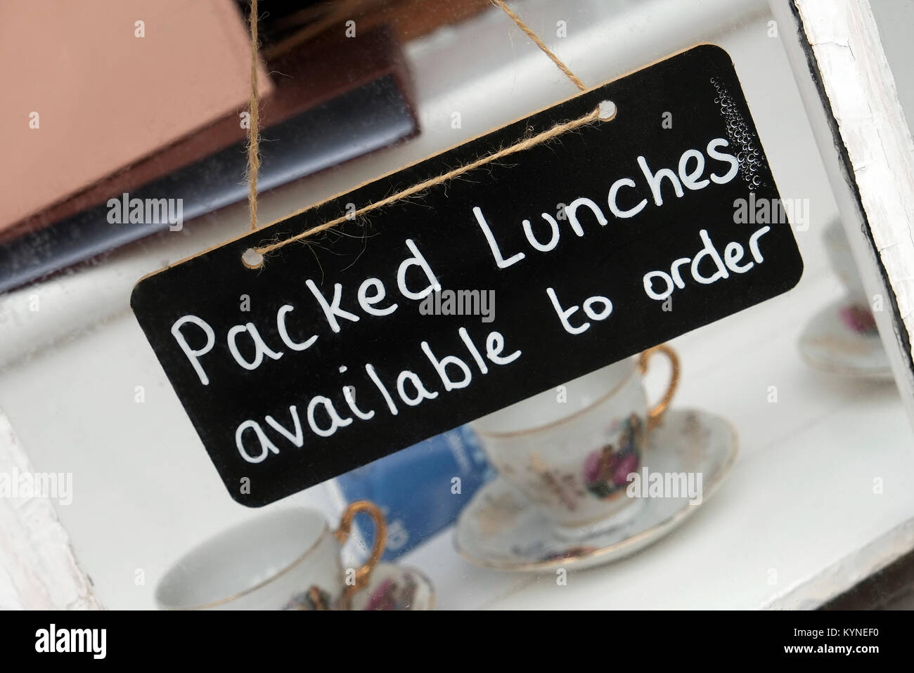 packed lunches available to order sign in cafe window Stock Photo