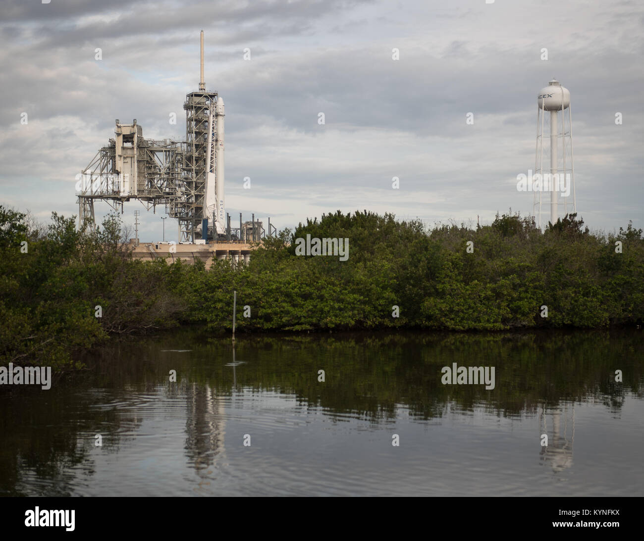 The SpaceX Falcon 9 rocket, with the Dragon spacecraft onboard, is seen at Launch Complex 39A at NASA’s Kennedy Space Center in Cape Canaveral, Florida, Saturday, June 3, 2017. Dragon is carrying almost 6,000 pounds of science research, crew supplies and hardware to the International Space Station in support of the Expedition 52 and 53 crew members. The unpressurized trunk of the spacecraft also will transport solar panels, tools for Earth-observation and equipment to study neutron stars. This will be the 100th launch, and sixth SpaceX launch, from this pad. Previous launches include 11 Apollo Stock Photo