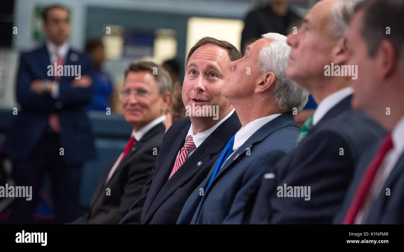 Acting NASA Administrator Robert Lightfoot, left, talks with Vice President Mike Pence, during an event where NASA introduced 12 new astronaut candidates, Wednesday, June 7, 2017 at NASA’s Johnson Space Center in Houston, Texas. After completing two years of training, the new astronaut candidates could be assigned to missions performing research on the International Space Station, launching from American soil on spacecraft built by commercial companies, and launching on deep space missions on NASA’s new Orion spacecraft and Space Launch System rocket. Photo Credit: (NASA/Bill Ingalls) Stock Photo