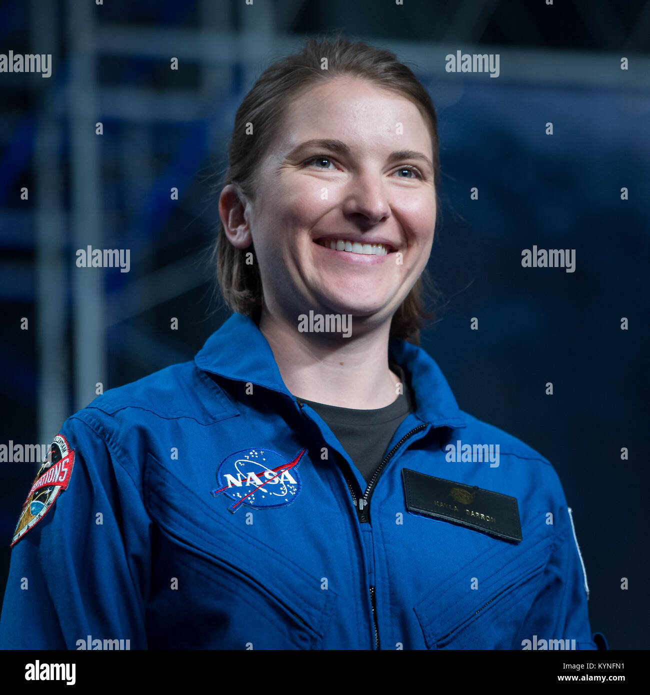 29-year-old NASA astronaut candidate Kayla Barron smiles as she is introduced as one of 12 new candidates, Wednesday, June 7, 2017 during an event at NASA’s Johnson Space Center in Houston, Texas. After completing two years of training, the new astronaut candidates could be assigned to missions performing research on the International Space Station, launching from American soil on spacecraft built by commercial companies, and launching on deep space missions on NASA’s new Orion spacecraft and Space Launch System rocket. Photo Credit: (NASA/Bill Ingalls) Stock Photo