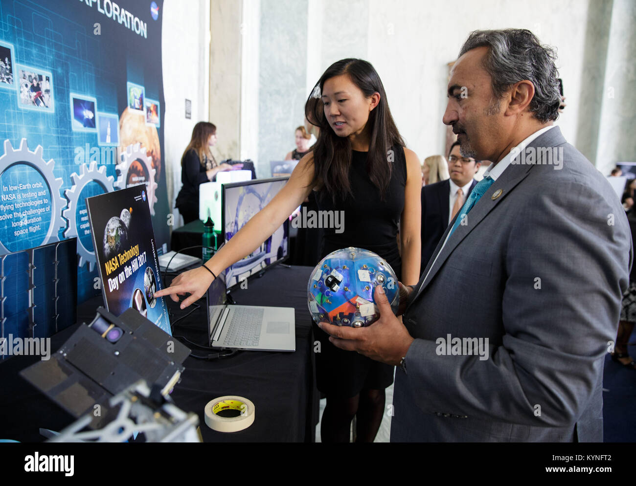 Rep. Ami Bera, D-Cali., views an exhibit at NASA's Tech Day on the Hill,  Thursday, June 15, 2017, in the Rayburn House Office Building in Washington.  Photo Credit: (NASA/Joel Kowsky) Stock Photo