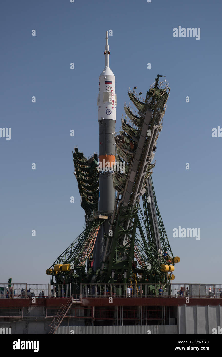 The Soyuz MS-05 spacecraft is seen as the service structure arms begin to close on the launch pad at the Baikonur Cosmodrome, Kazakhstan, Wednesday, July 26, 2017.  Expedition 52 flight engineer Sergei Ryazanskiy of Roscosmos, flight engineer Randy Bresnik of NASA, and flight engineer Paolo Nespoli of ESA (European Space Agency), are scheduled to launch to the International Space Station aboard the Soyuz spacecraft from the Baikonur Cosmodrome on July 28.  Photo Credit: (NASA/Joel Kowsky) Stock Photo