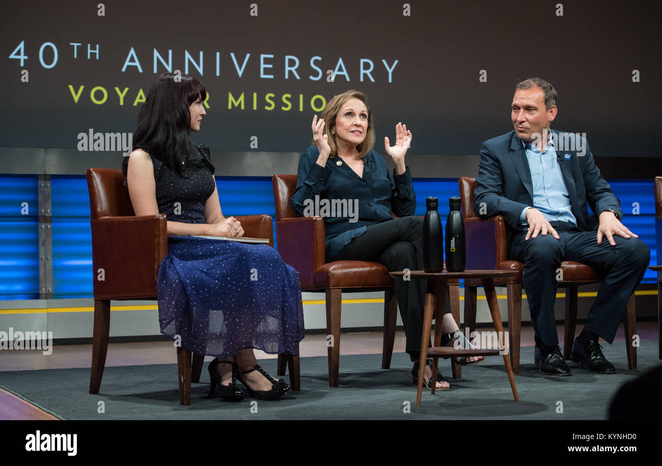 Ann Druyan, writer/producer and golden record visionary, speaks on a panel with moderator Victoria Jaggard, National Geographic Magazine science editor, left, Thomas Zurbuchen, associate administrator for NASA's Science Mission Directorate, right; and Ed Stone, Voyager project scientist, not pictured, at an event to celebrate the 40th Anniversary of the launch of the Voyager 1 and 2 missions, Tuesday, September 5, 2017 at National Geographic Society Headquarters in Washington. Voyager 1 was launched September 5, 1977, with a mission to study Jupiter and Saturn, but now the twin Voyager spacecr Stock Photo
