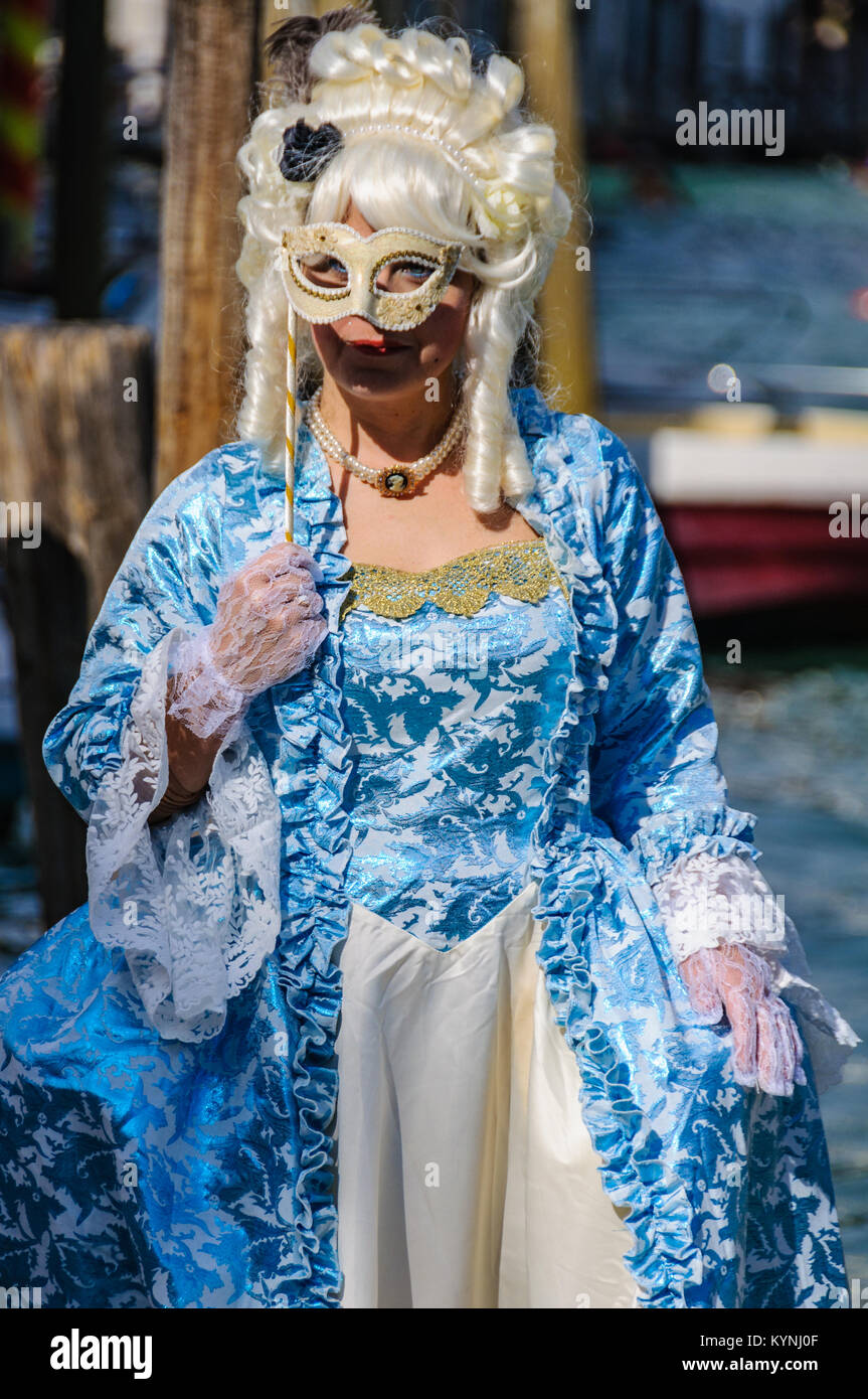 Woman wearing blue costume during the Carnival in Venica, Italy Stock Photo
