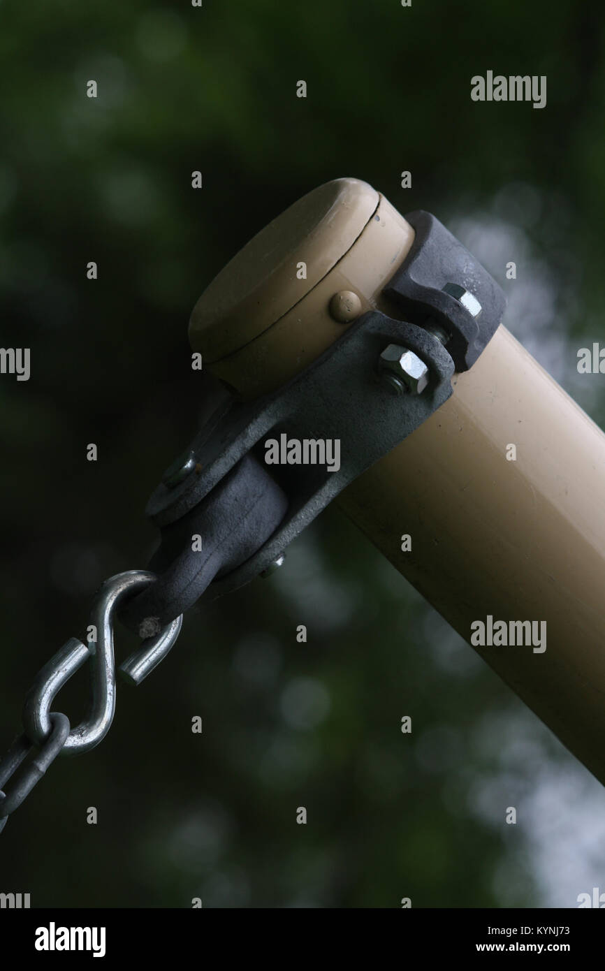 Metal pipe with chain connector Stock Photo - Alamy
