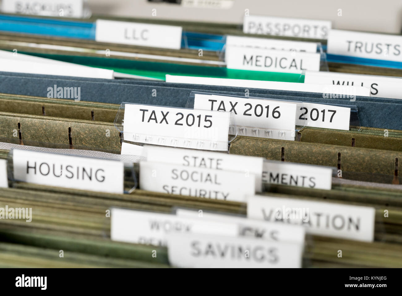 Home filing system for taxes organized in folders Stock Photo