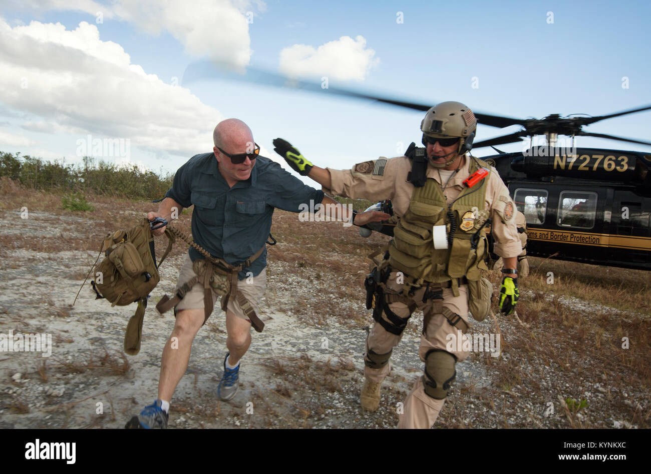Eressing On September 12, 2017, CBP Air and Marine Operations Agent Mickey Hohol ...