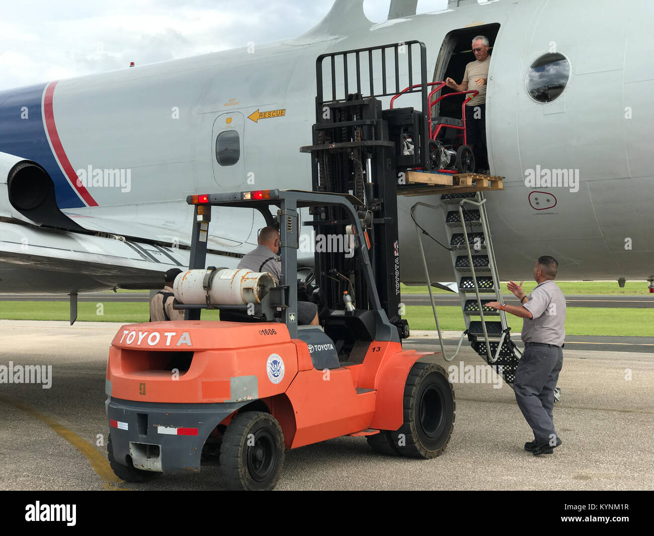 AMO P-3 crews conducting humanitarian flights transport supplies from Jacksonville, FL, to Aguadilla, PR, following Hurricane Maria. September 22, 2017.   Photo by Carlos Rivera Stock Photo