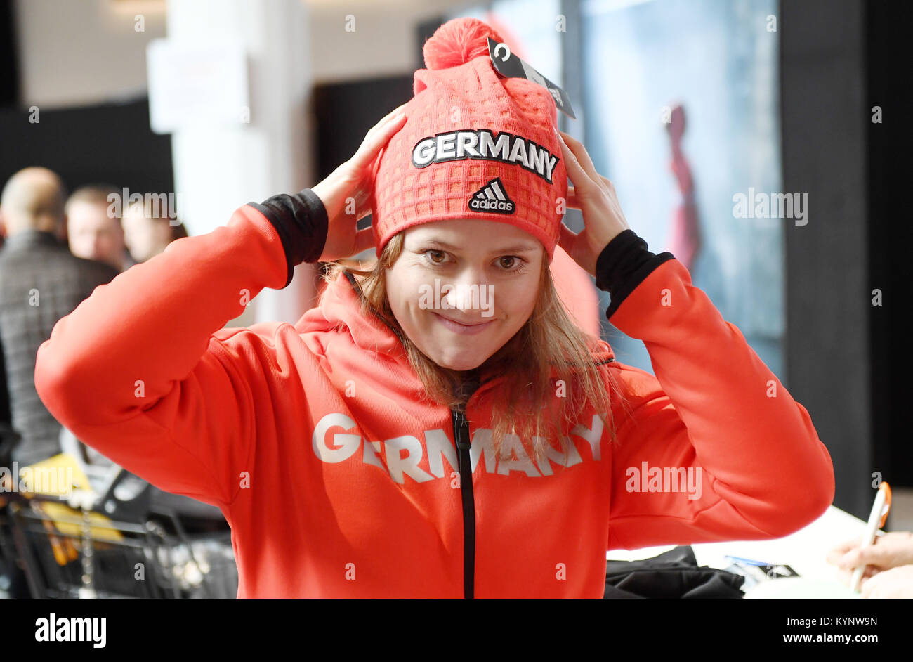 Munich, Germany. 15th Jan, 2018. The ski racer Viktoria Rebensburg puts on  a hat during the official outfitting of the German Olympic Team for the  Winter Olympics in Pyeongchang, South Korea, in