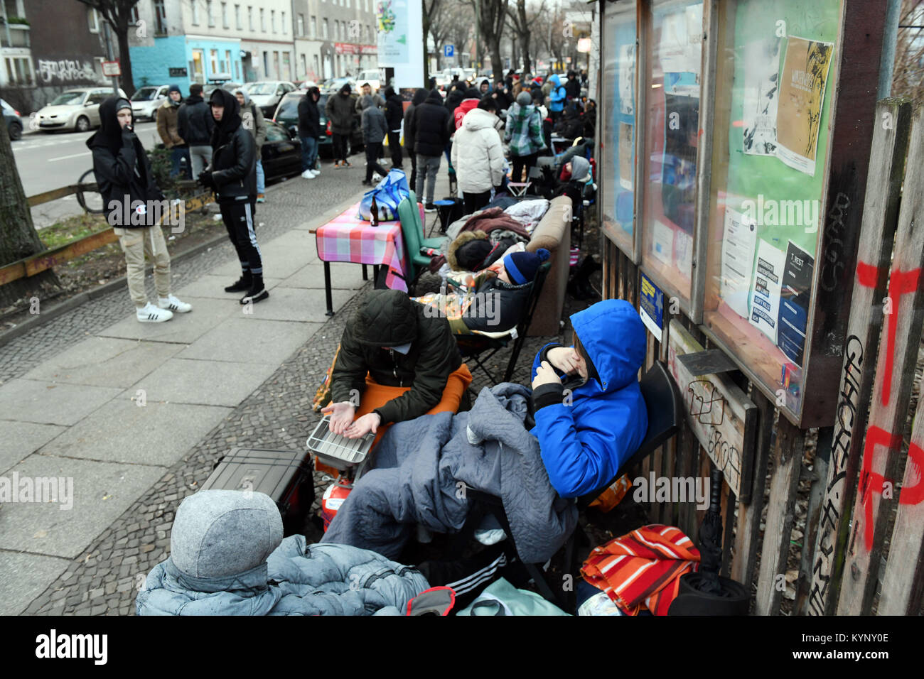 Several hundred people camp in front of a shoe store which is to sell the  Adidas sneaker with integrated BVG (Berlin Transport Company) annual ticket  in Berlin, Germany, 15 January 2018. The