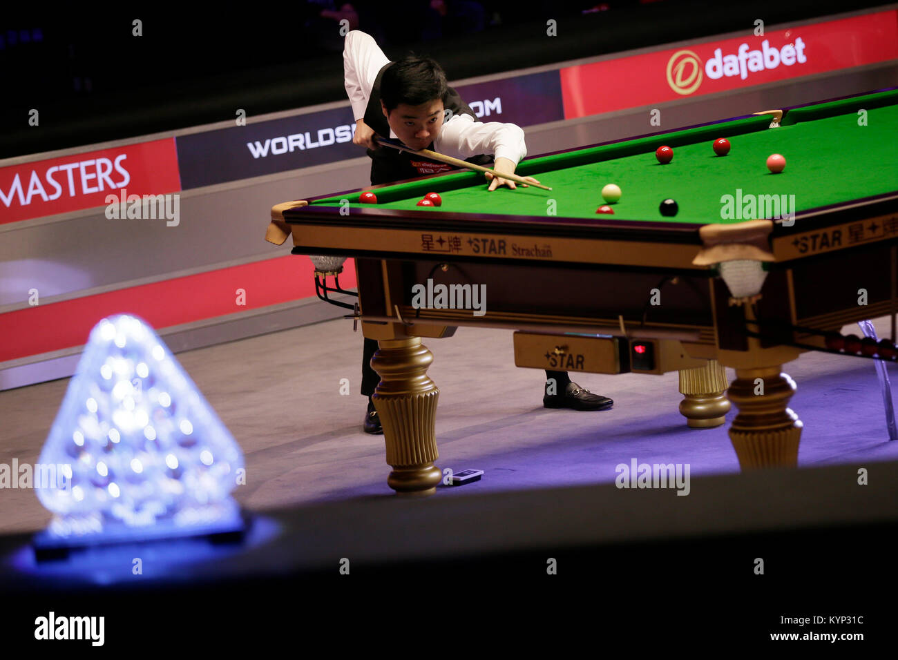 London, UK. 15th Jan, 2018. Ding Junhui of China hits the ball during ...