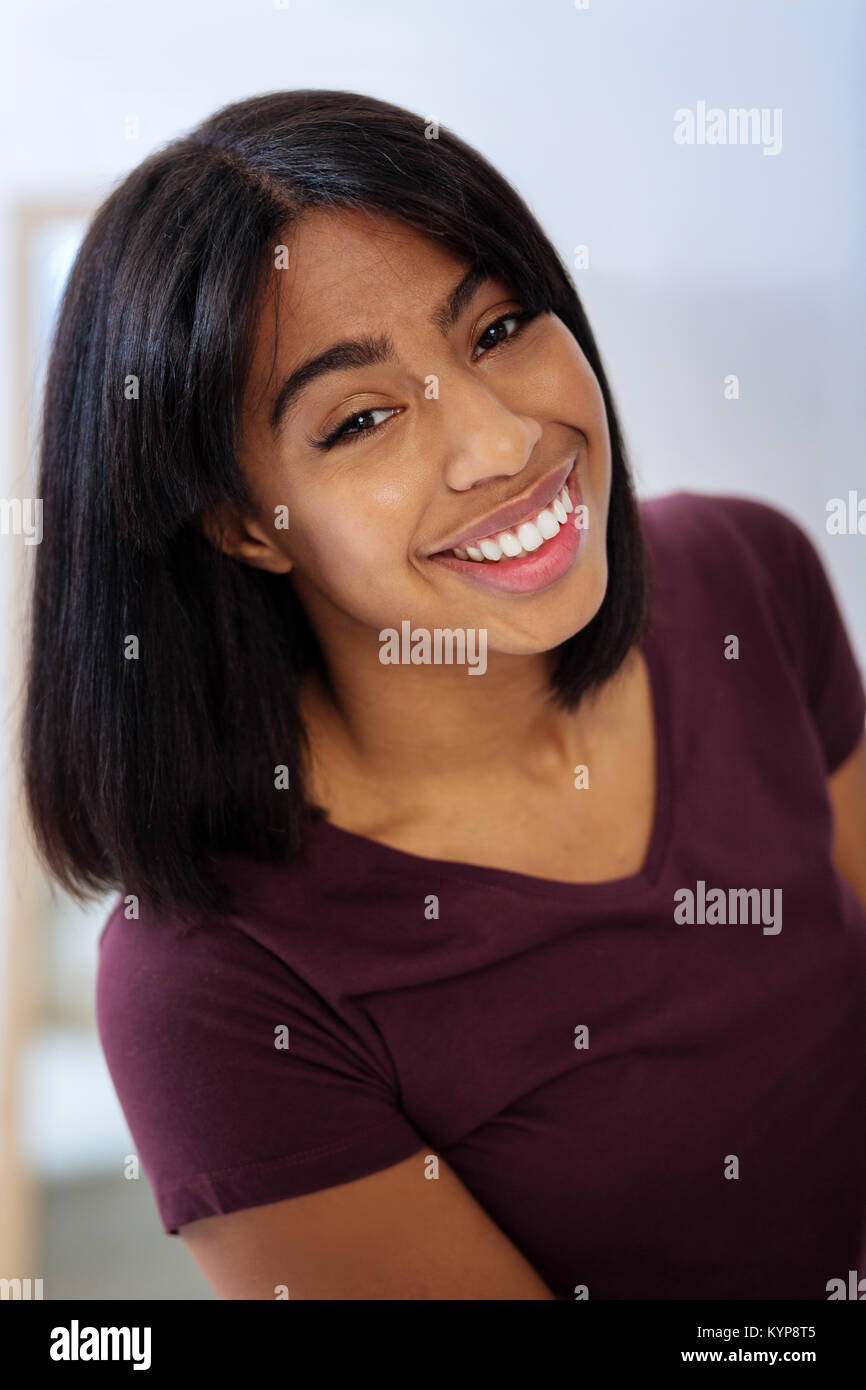 Emotional portrait of a beautiful woman smiling while working Stock Photo