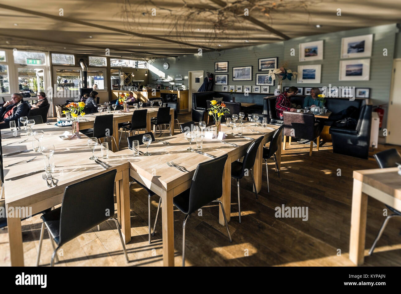 Restaurant interior - tables set for a meal in a restuarant. Stock Photo