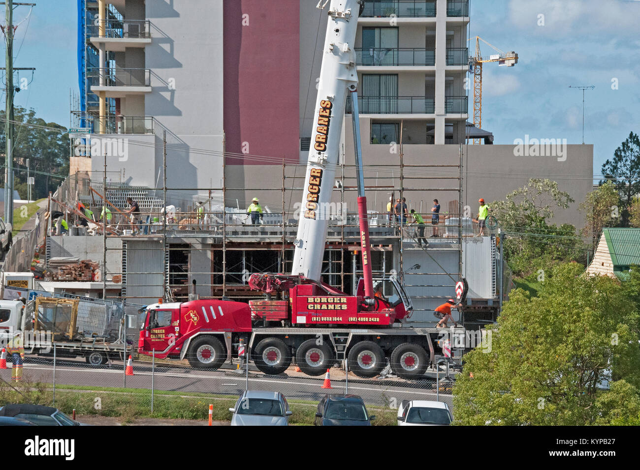 Crane lifting bricks hires stock photography and images Alamy