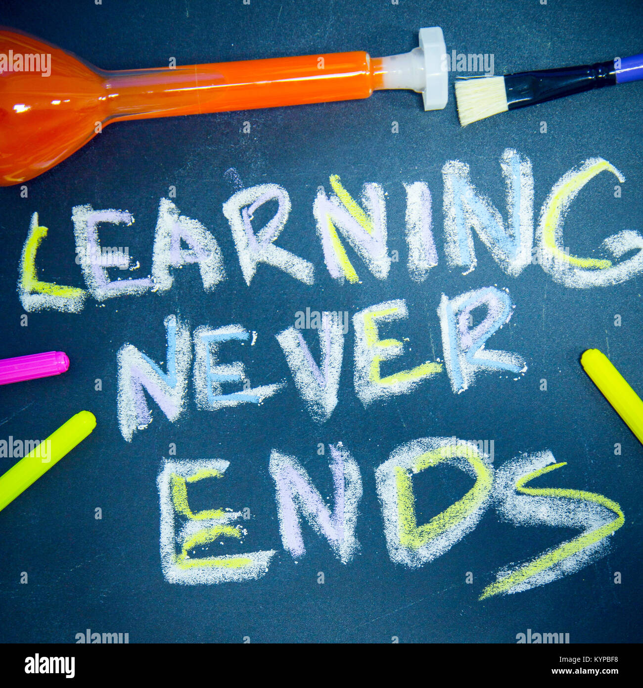 Education concept on a black chalkboard Stock Photo Alamy