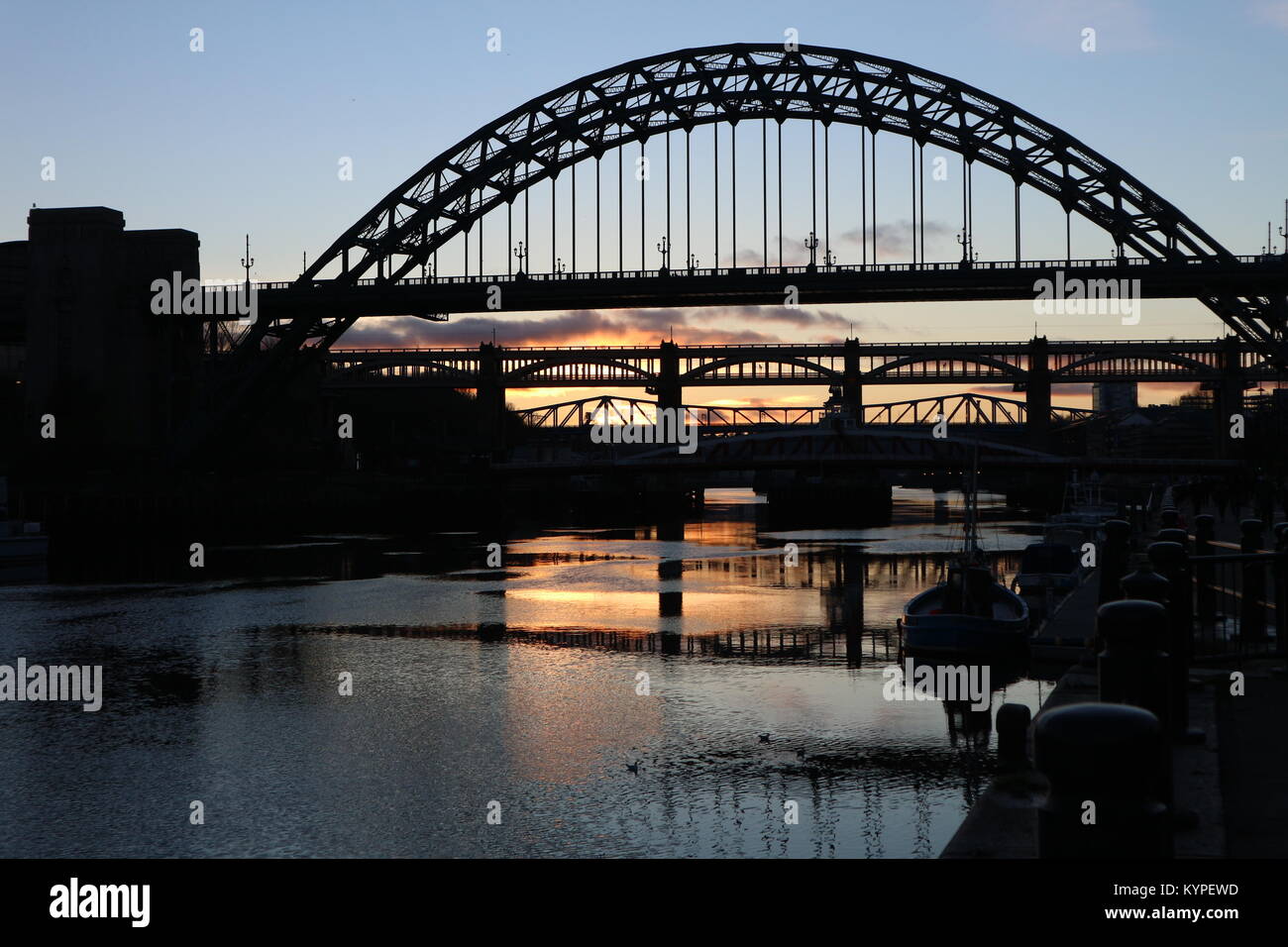 A photograph of the river Tyne in Newcastle and its many bridges at sunset. The shot was taken in December 2017 Stock Photo