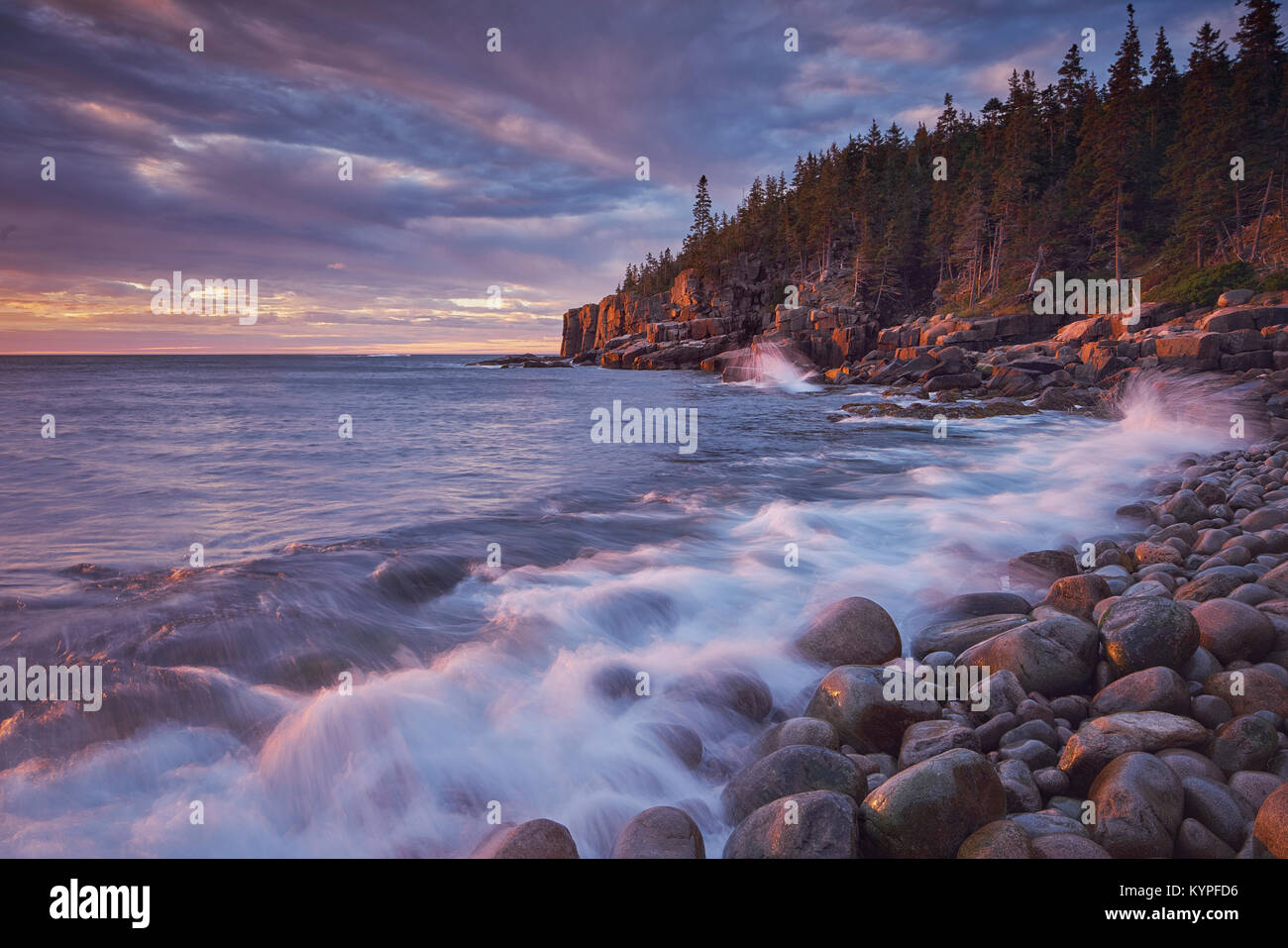 Sunrise from Boulder Beach at Otter Cliffs in Acadia National Park in Maine Stock Photo