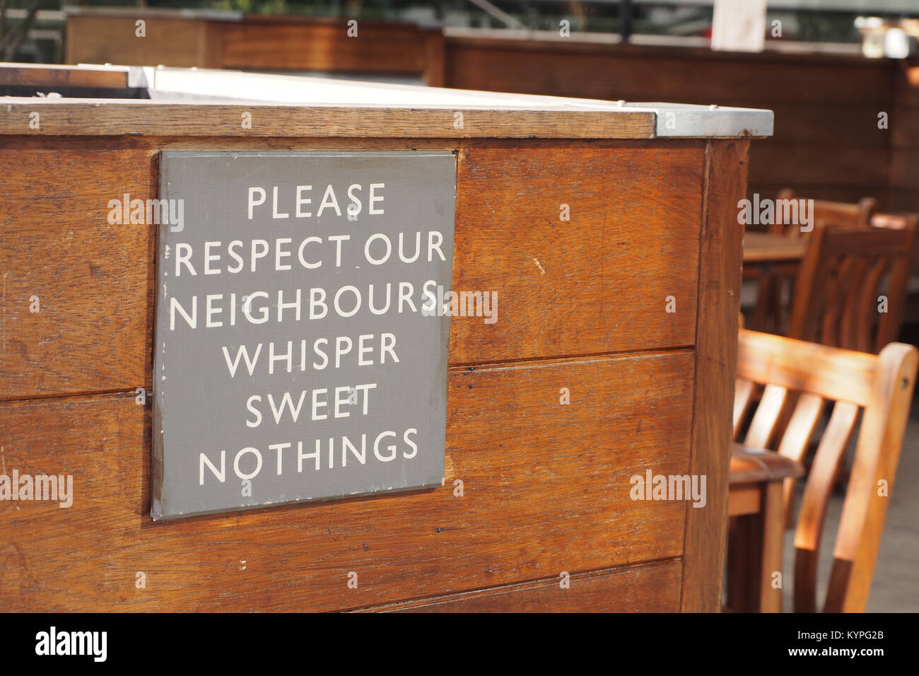 A comical sign in a cafe situated on the banks of the River Thames near Southwark bridge, London Stock Photo
