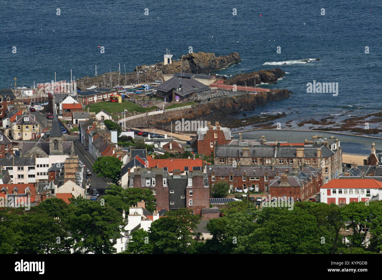 View from the top of Berwick Law over the Scottish seaside resort of North Berwick East Lothian Scotland showing the harbour and town Stock Photo