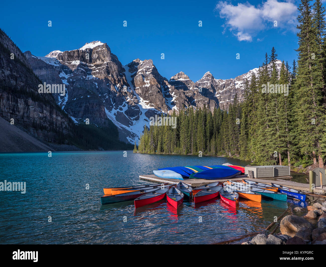 Canoes, Moraine Lake, Lake Louise area of Banff National Park, Alberta, Canada. Stock Photo