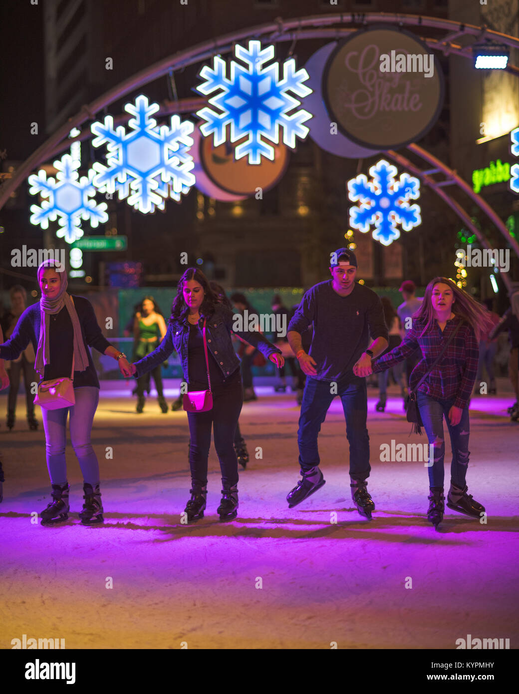Friends Ice Skating at CitySkate, Cityscape, Downtown Phoenix, Arizona