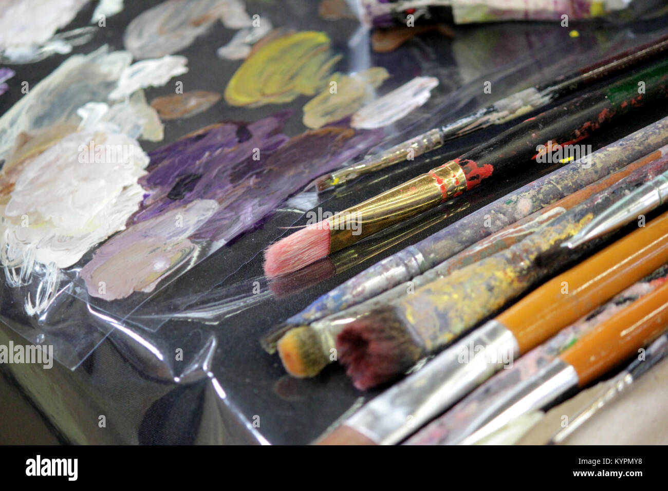 art materials, artists paint brushes and palette Stock Photo