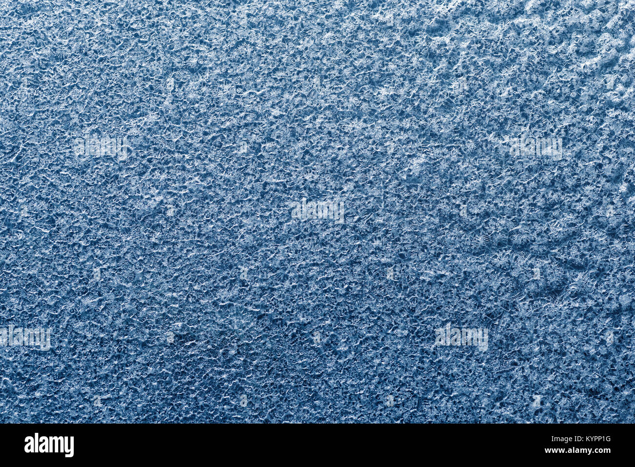 Textures and backgrounds: abstract winter pattern, seasonal background. Flat surface, covered with ice-like crystals of dried salt. Stock Photo